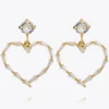 Caroline Svedbom Baguette Heart Örhängen/ Crystal (Guld)
