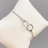 Celine Estelle Silverarmband med ringar och CZ stenar- Reglerbart