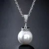 KAMPANJ Celine Estelle Silverhalsband med Vitguld, Sötvattenpärla och CZ 40+5 cm