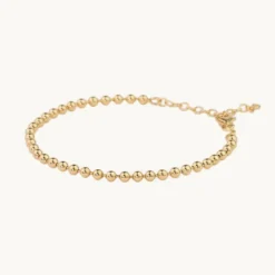 Armband Emma Israelsson Globe Guld Brace055