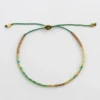 Armband Syster P Code Guld GOOD VIBES